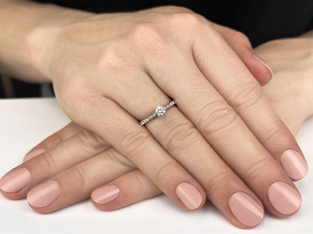 Timeless Round Engagement Ring With Side Diamonds