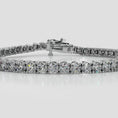 Load and play video in Gallery viewer, Four Prong Classic Tennis Bracelet
