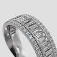 Load and play video in Gallery viewer, Round And Baguettes Brilliance Anniversary Ring
