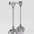 Load and play video in Gallery viewer, Finishing Touch Pearl And Diamond Drop Earrings
