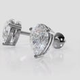 Load and play video in Gallery viewer, Radiant Romance Pear Shaped Stud Earrings
