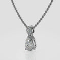 Load and play video in Gallery viewer, Round And Pear Diamond Pendant
